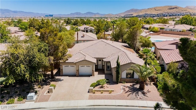 4493 Rometta Ave, Las Vegas, NV 89141 - aerial perspective of suburban area featuring a mountain backdrop
