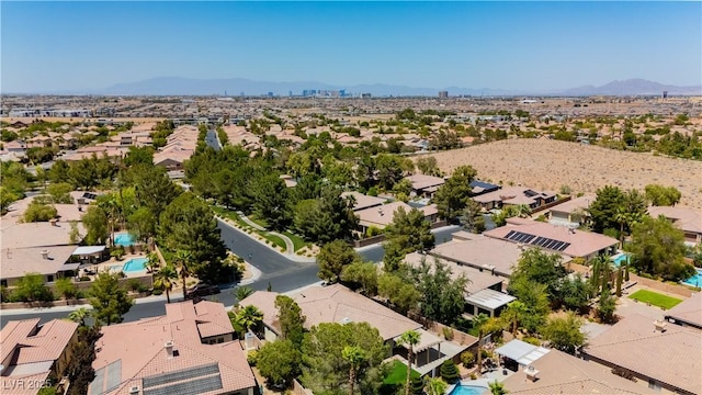 4493 Rometta Ave, Las Vegas, NV 89141 - aerial perspective of suburban area with mountains