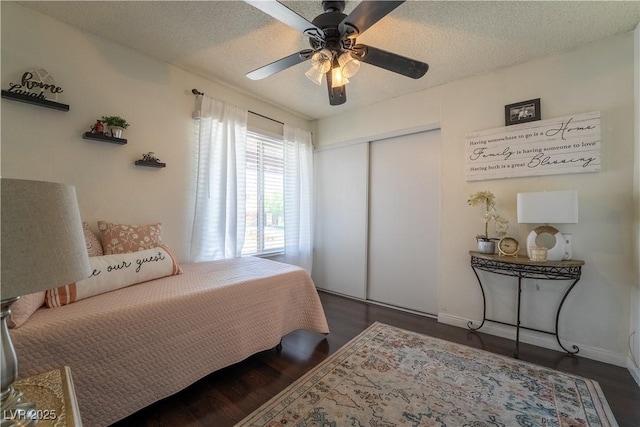 4129 Ridgewood Ave, Las Vegas, NV 89120 - bedroom with a closet, a textured ceiling, wood finished floors, and ceiling fan