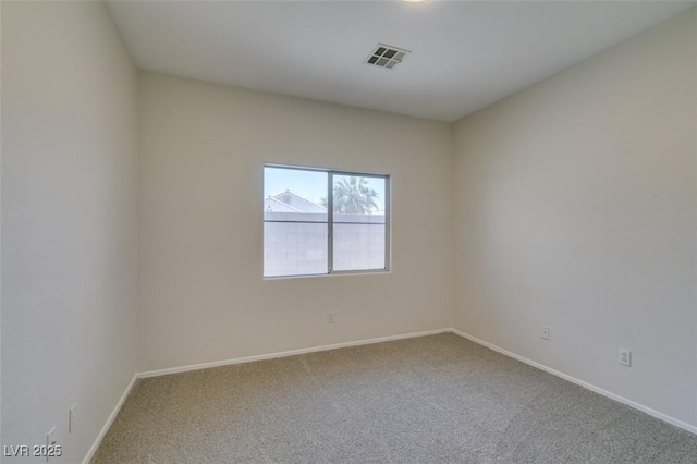 1453 Doggett Ave, Las Vegas, NV 89123 - carpeted spare room featuring baseboards