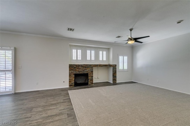 1453 Doggett Ave, Las Vegas, NV 89123 - unfurnished living room featuring ornamental molding, a fireplace, a ceiling fan, and dark wood-style floors