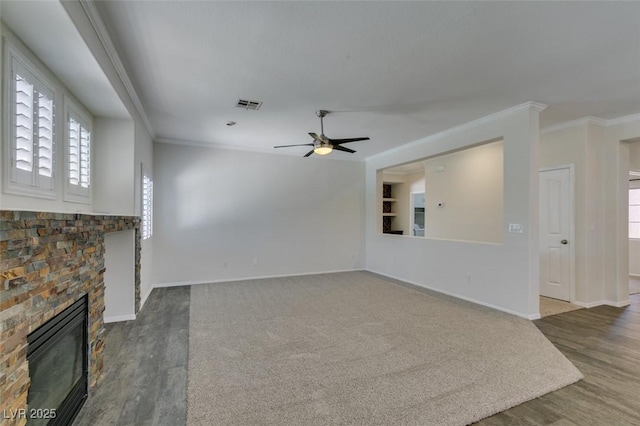 1453 Doggett Ave, Las Vegas, NV 89123 - unfurnished living room featuring ceiling fan, ornamental molding, wood finished floors, and a glass covered fireplace