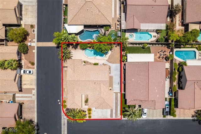 1453 Doggett Ave, Las Vegas, NV 89123 - aerial view of property and surrounding area with a pool and property boundaries highlighted