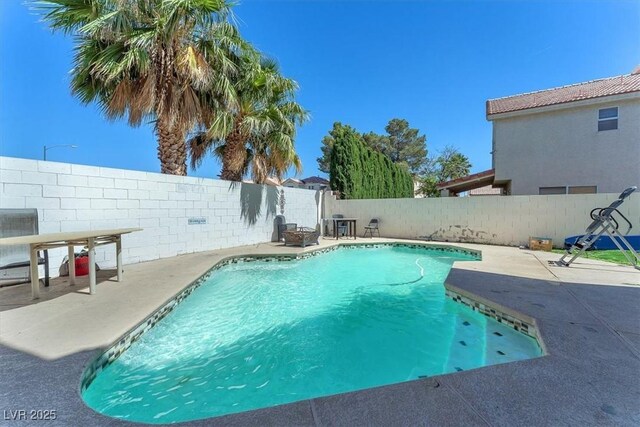 5612 Royal Castle Ln, Las Vegas, NV 89130 - view of swimming pool with a patio and a fenced backyard