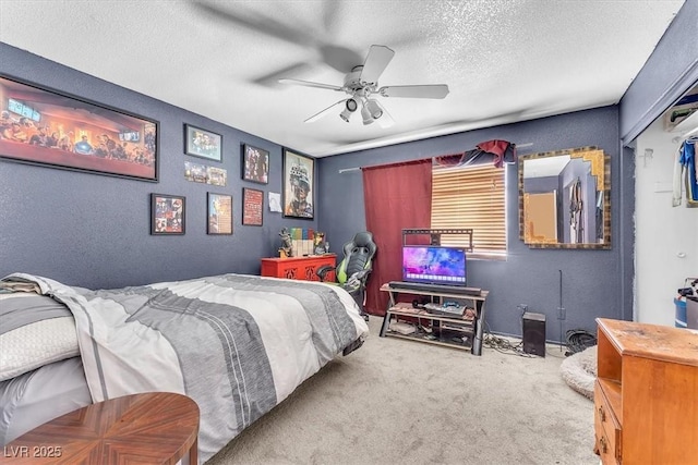 5612 Royal Castle Ln, Las Vegas, NV 89130 - carpeted bedroom featuring a textured ceiling and a ceiling fan