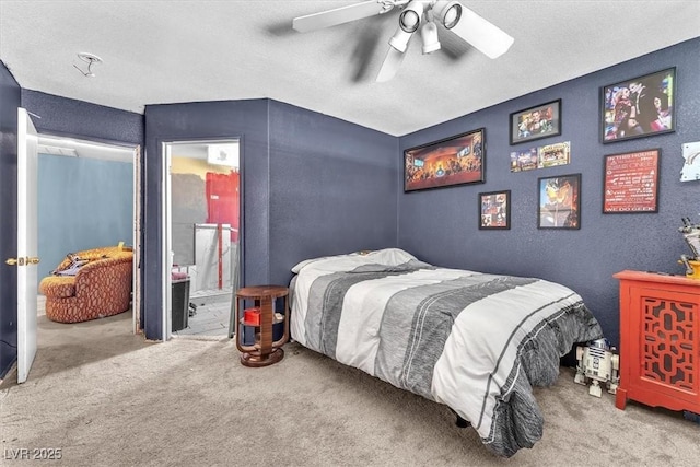 5612 Royal Castle Ln, Las Vegas, NV 89130 - carpeted bedroom with ceiling fan and connected bathroom