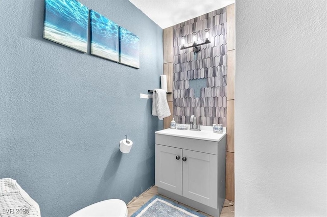 5612 Royal Castle Ln, Las Vegas, NV 89130 - bathroom featuring a textured wall and vanity