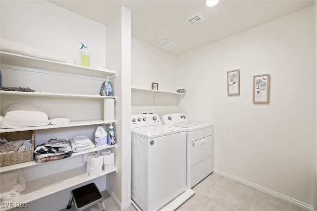7730 Moore Creek Ln, North Las Vegas, NV 89084 - washroom featuring separate washer and dryer and baseboards