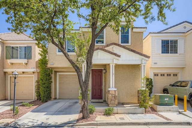 6125 Broken Slate Way, Las Vegas, NV 89139 - multi unit property featuring a garage, stucco siding, and concrete driveway