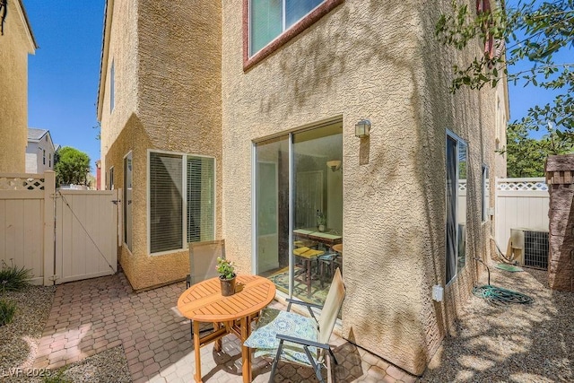 6125 Broken Slate Way, Las Vegas, NV 89139 - view of patio featuring a gate