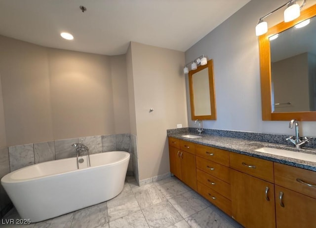 4525 Dean Martin Dr Unit 2704, Las Vegas, NV 89103 - bathroom featuring double vanity, a freestanding bath, and marble finish flooring