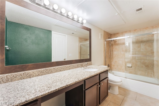 2866 Loveland Dr Unit 2018, Las Vegas, NV 89109 - bathroom featuring vanity, tile patterned floors, and bath / shower combo with glass door