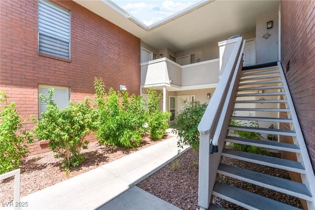 2866 Loveland Dr Unit 2018, Las Vegas, NV 89109 - exterior space featuring stairs, brick siding, and stucco siding