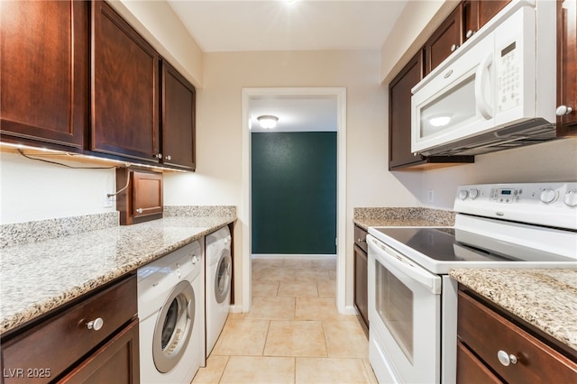 2866 Loveland Dr Unit 2018, Las Vegas, NV 89109 - kitchen with white appliances, light stone counters, light tile patterned floors, and dark brown cabinetry