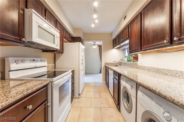 2866 Loveland Dr Unit 2018, Las Vegas, NV 89109 - kitchen with white appliances, washer / clothes dryer, a ceiling fan, and light tile patterned flooring