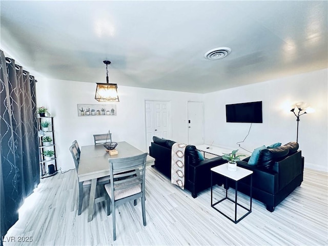 5821 Marka Dr, Las Vegas, NV 89108 - dining room with light wood-style flooring
