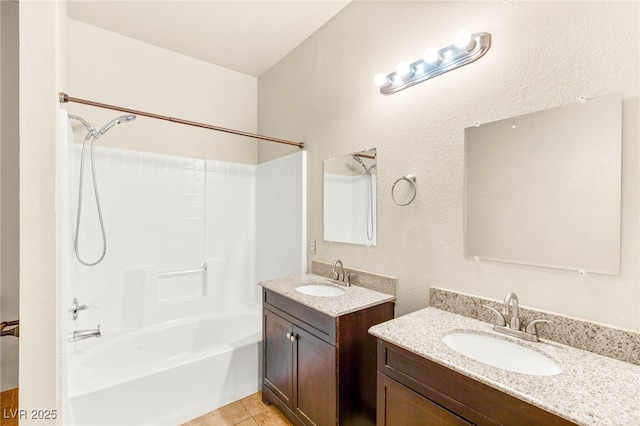 4830 Grey Wolf Ln Unit 104, Las Vegas, NV 89149 - bathroom with shower / bathtub combination, two vanities, and tile patterned flooring