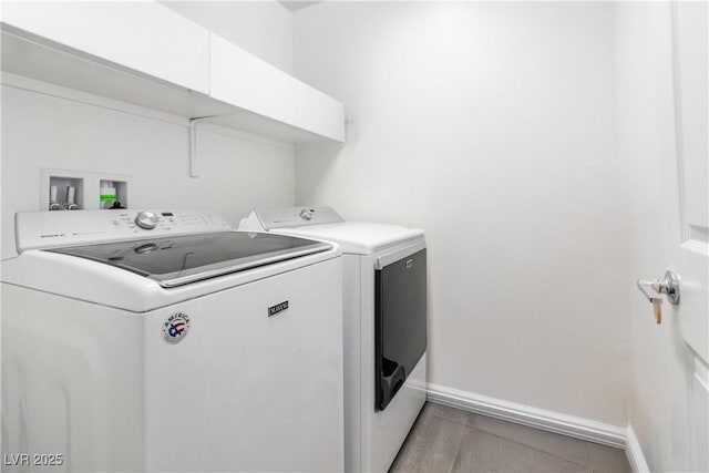 10013 Sable Point St, Las Vegas, NV 89178 - laundry area featuring separate washer and dryer and light wood-style floors