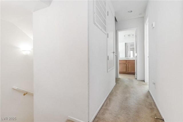 10013 Sable Point St, Las Vegas, NV 89178 - hall featuring light carpet and baseboards