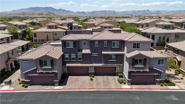 10013 Sable Point St, Las Vegas, NV 89178 - aerial perspective of suburban area with a mountainous background