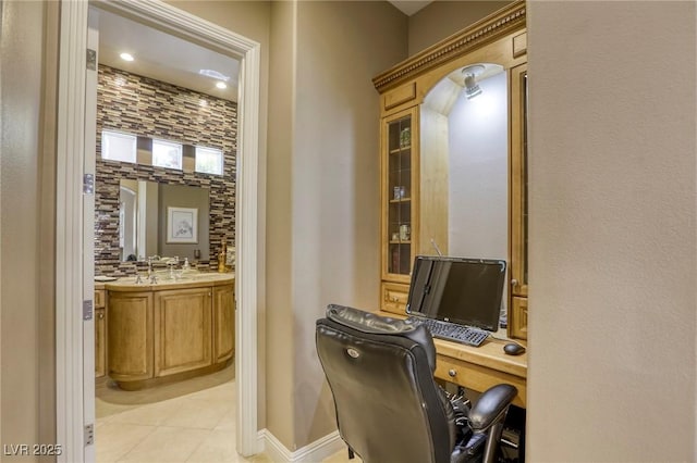 2008 Winter Wind St, Las Vegas, NV 89134 - home office with light tile patterned flooring and baseboards
