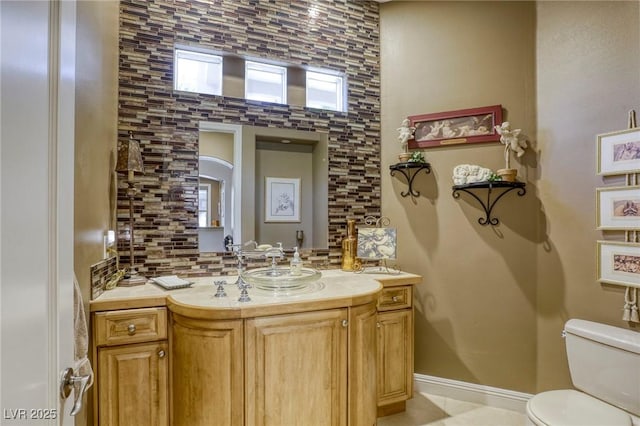 2008 Winter Wind St, Las Vegas, NV 89134 - bathroom featuring vanity and decorative backsplash