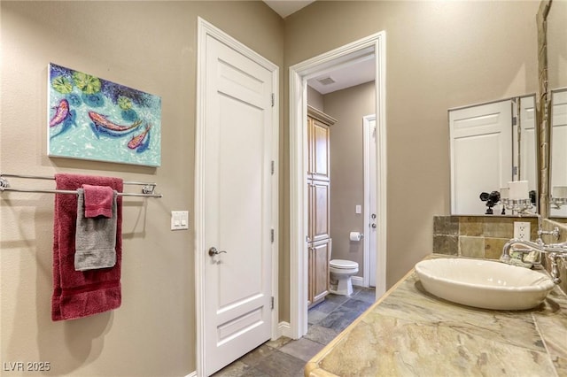 2008 Winter Wind St, Las Vegas, NV 89134 - bathroom featuring vanity and stone finish flooring