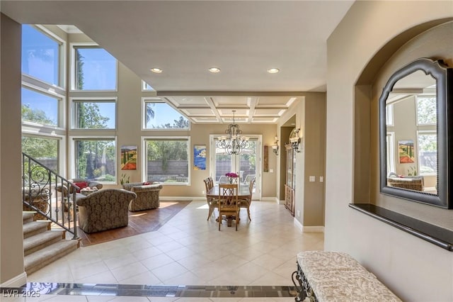 2008 Winter Wind St, Las Vegas, NV 89134 - living area with light tile patterned flooring, coffered ceiling, a chandelier, recessed lighting, and beamed ceiling