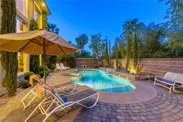 2008 Winter Wind St, Las Vegas, NV 89134 - view of swimming pool with a patio area, a fenced backyard, and a pool with connected hot tub