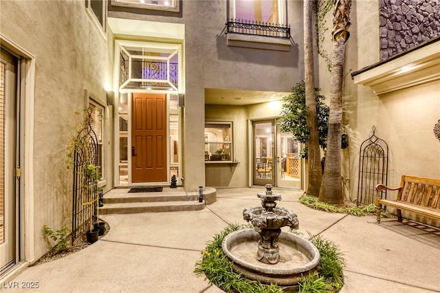2008 Winter Wind St, Las Vegas, NV 89134 - doorway to property with stucco siding and french doors