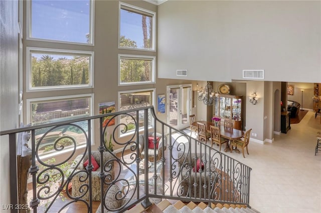 2008 Winter Wind St, Las Vegas, NV 89134 - stairway featuring a high ceiling and a chandelier
