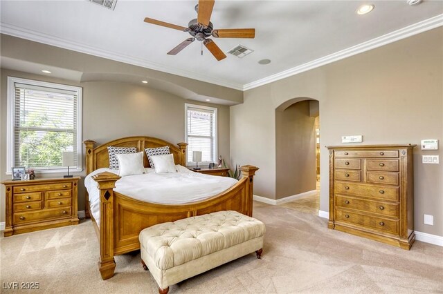 2008 Winter Wind St, Las Vegas, NV 89134 - bedroom with arched walkways, light carpet, crown molding, multiple windows, and recessed lighting