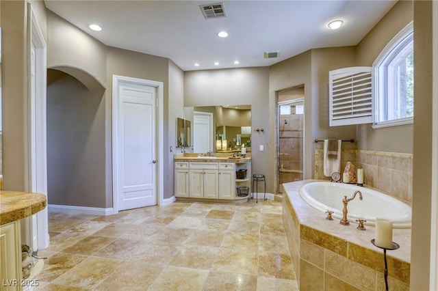 2008 Winter Wind St, Las Vegas, NV 89134 - full bath featuring vanity, a shower stall, and a bath