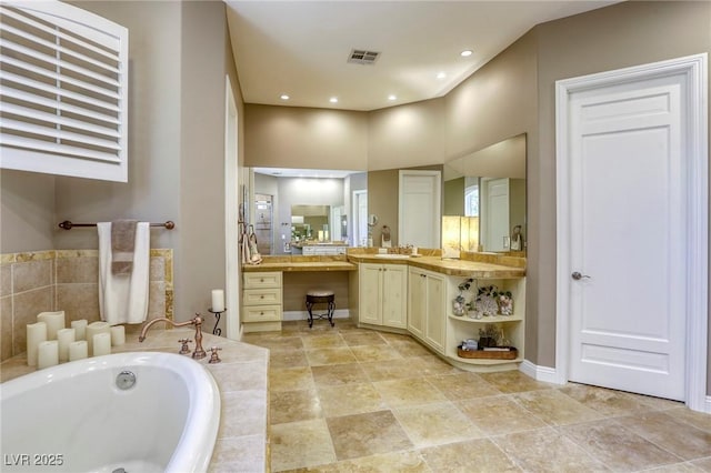 2008 Winter Wind St, Las Vegas, NV 89134 - bathroom with a bath and vanity