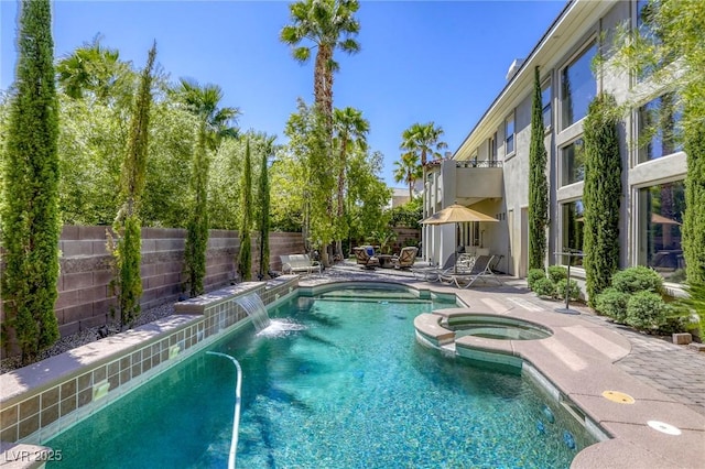 2008 Winter Wind St, Las Vegas, NV 89134 - view of pool with a patio, a fenced backyard, and a pool with connected hot tub