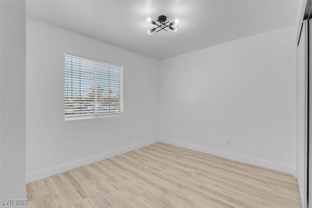 2832 Sing Song Way, Las Vegas, NV 89106 - unfurnished room featuring wood finished floors