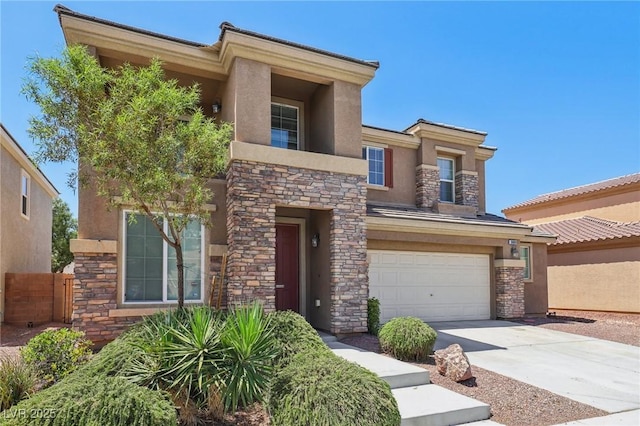 3609 Kingfishers Catch Ave, North Las Vegas, NV 89084 - view of front of house featuring stone siding, an attached garage, stucco siding, and driveway