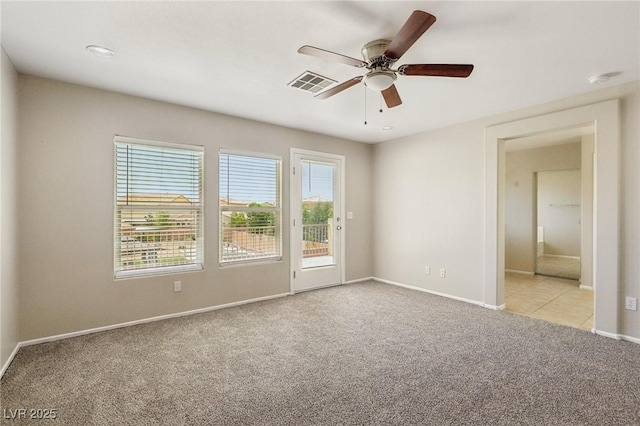 3609 Kingfishers Catch Ave, North Las Vegas, NV 89084 - unfurnished room with light carpet, plenty of natural light, and ceiling fan