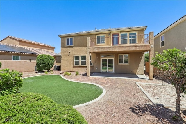 3609 Kingfishers Catch Ave, North Las Vegas, NV 89084 - rear view of property with a balcony, a patio, and stucco siding