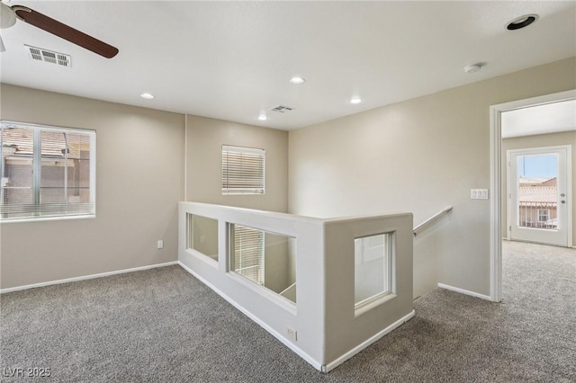 3609 Kingfishers Catch Ave, North Las Vegas, NV 89084 - unfurnished room with carpet, ceiling fan, plenty of natural light, recessed lighting, and a smoke detector