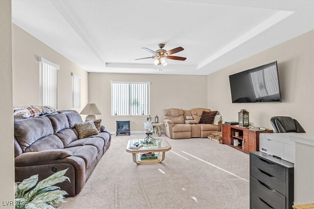 2194 Trivero St, Henderson, NV 89044 - living area featuring a raised ceiling, ceiling fan, and carpet floors