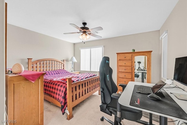 2194 Trivero St, Henderson, NV 89044 - bedroom featuring light carpet, a desk, and a ceiling fan