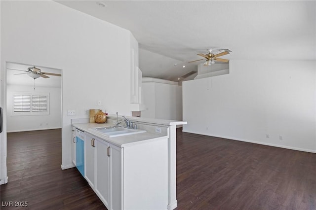 6209 Lenaking Ave, Las Vegas, NV 89122 - kitchen featuring a ceiling fan, light countertops, vaulted ceiling, dishwasher, and dark wood finished floors