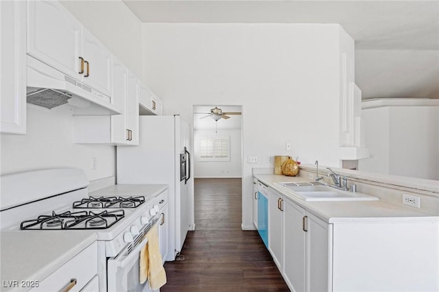 6209 Lenaking Ave, Las Vegas, NV 89122 - kitchen featuring white appliances, under cabinet range hood, a ceiling fan, light countertops, and white cabinets