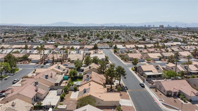 6209 Lenaking Ave, Las Vegas, NV 89122 - aerial perspective of suburban area with a mountainous background