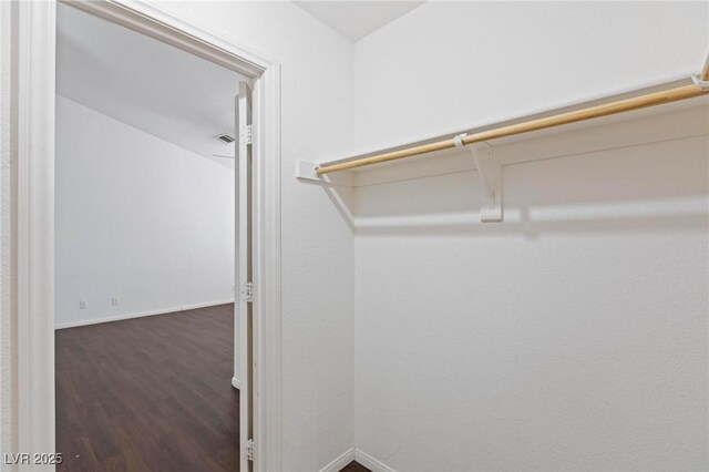 6209 Lenaking Ave, Las Vegas, NV 89122 - spacious closet with wood finished floors