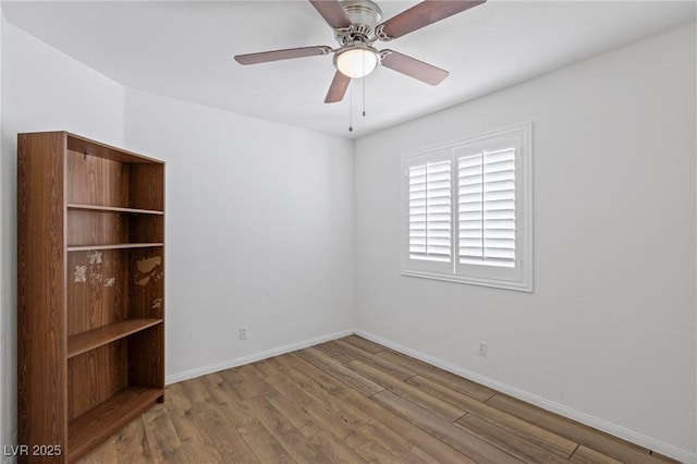 6209 Lenaking Ave, Las Vegas, NV 89122 - empty room featuring wood finished floors and ceiling fan