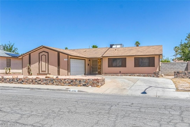 4784 El Escorial Dr, Las Vegas, NV 89121 - view of front of property with a garage and driveway
