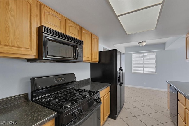 4784 El Escorial Dr, Las Vegas, NV 89121 - kitchen featuring black appliances and light tile patterned floors