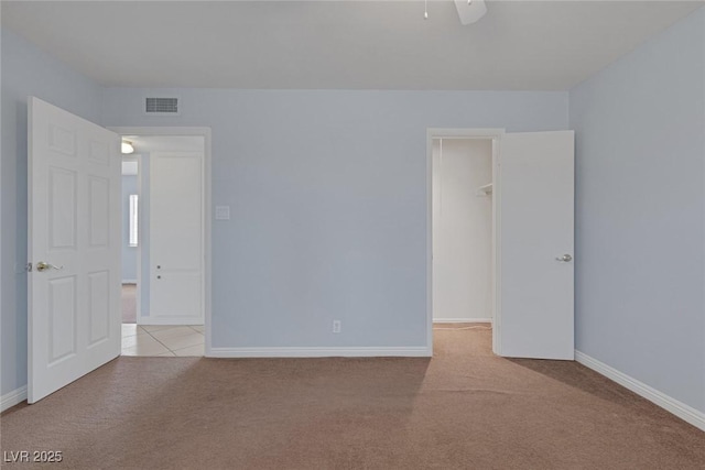4784 El Escorial Dr, Las Vegas, NV 89121 - carpeted spare room featuring baseboards and a ceiling fan